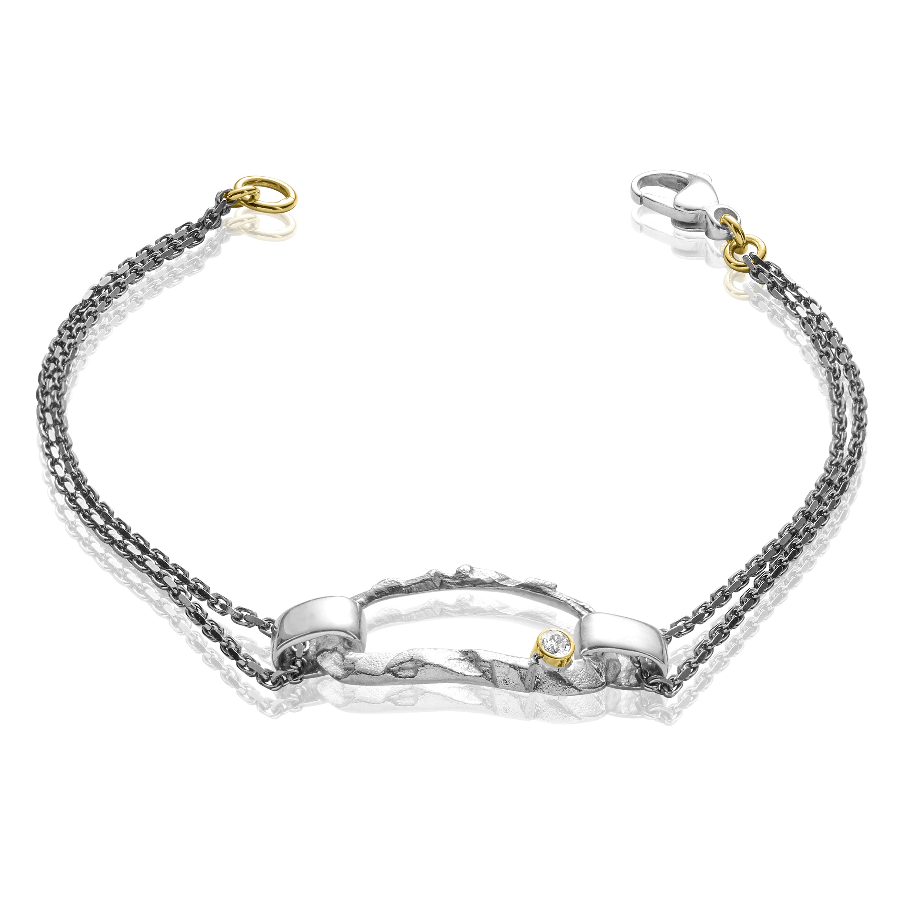 Iwa Exquis udsøgt sort sølv/sølv armbånd med guld og diamant.