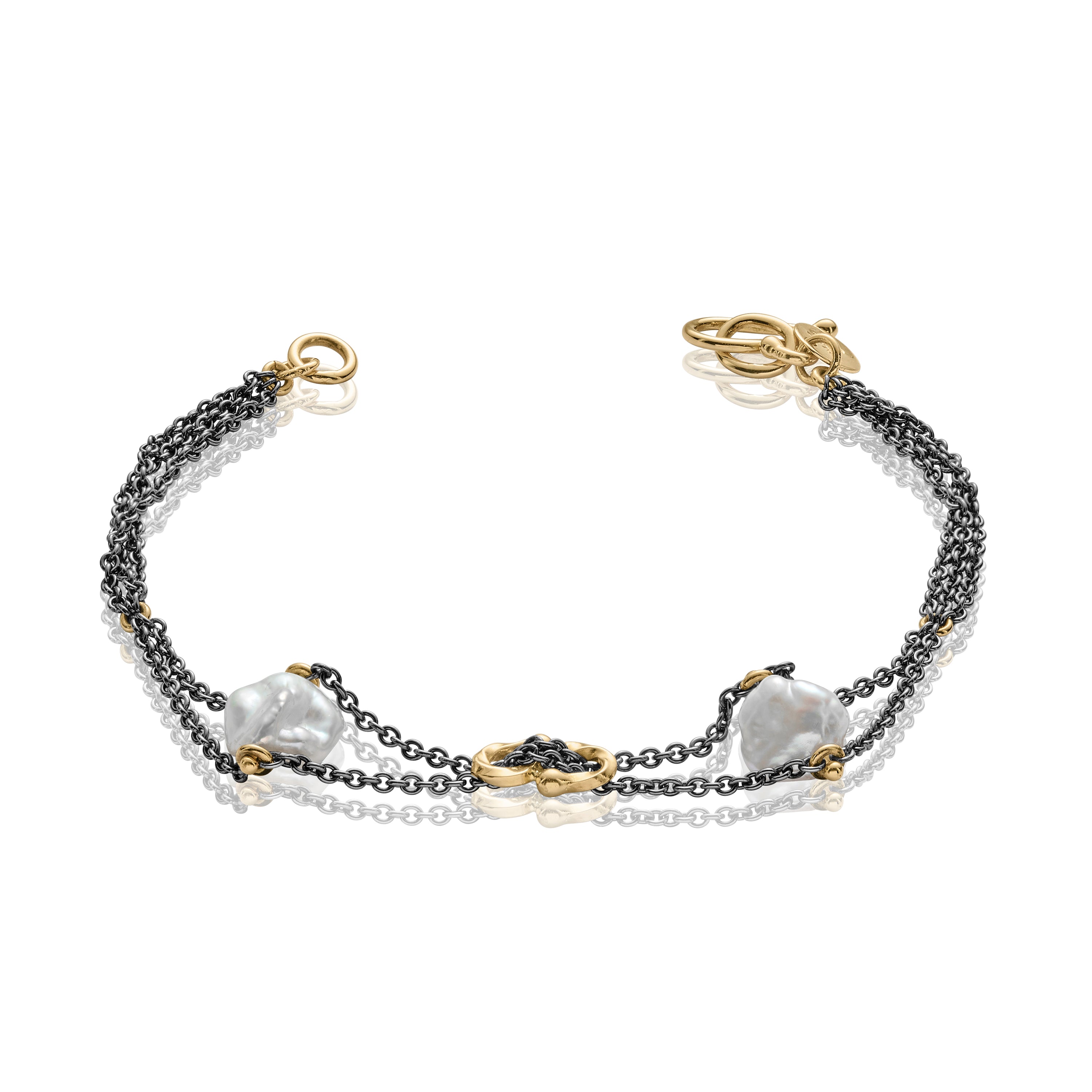 Hannako Lily Petit dragende sort sølv armbånd med guld og perler.