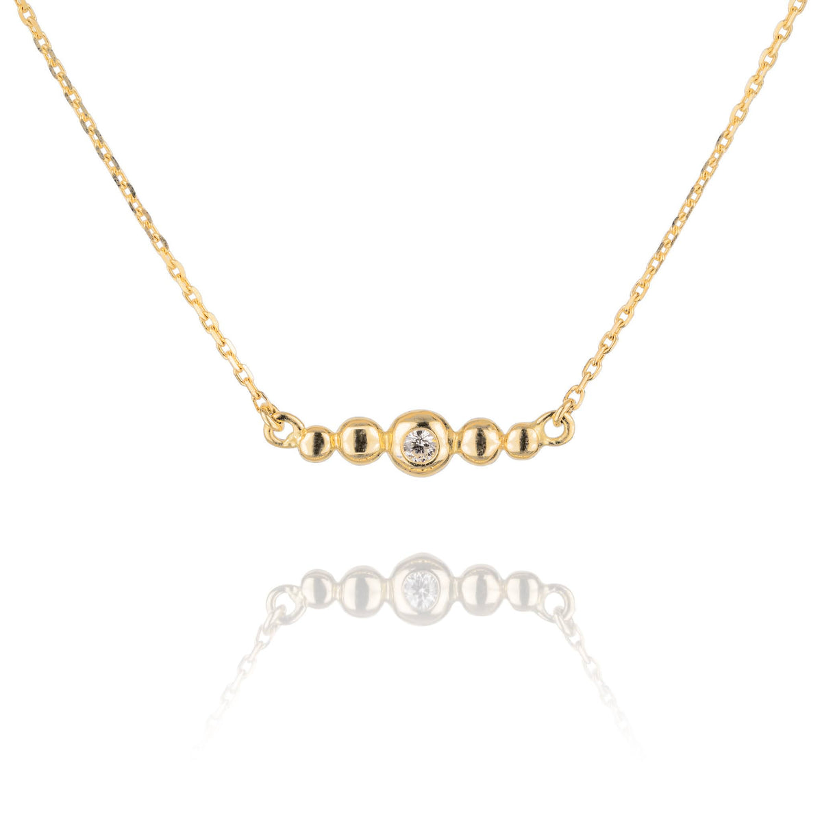 Halsband i 14 karat guld med briljanter ur serien Obi, handgjort av Rebecca Falck