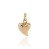 Toyo Mature Exquisite pendant in gold with a diamond.