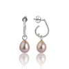 Obi Perssion  Raffinerande silver örhängen med rosa pärlor.