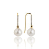 Obi Albe  luksuriøse sølv/guld ørestikker med champagnefarve diamanter og hvide perler.