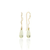 Yuuki Mature Attractive gold earrings with drop-shaped stone and brilliants.