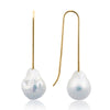 Sato Alba Exclusive gold earrings with pearls.