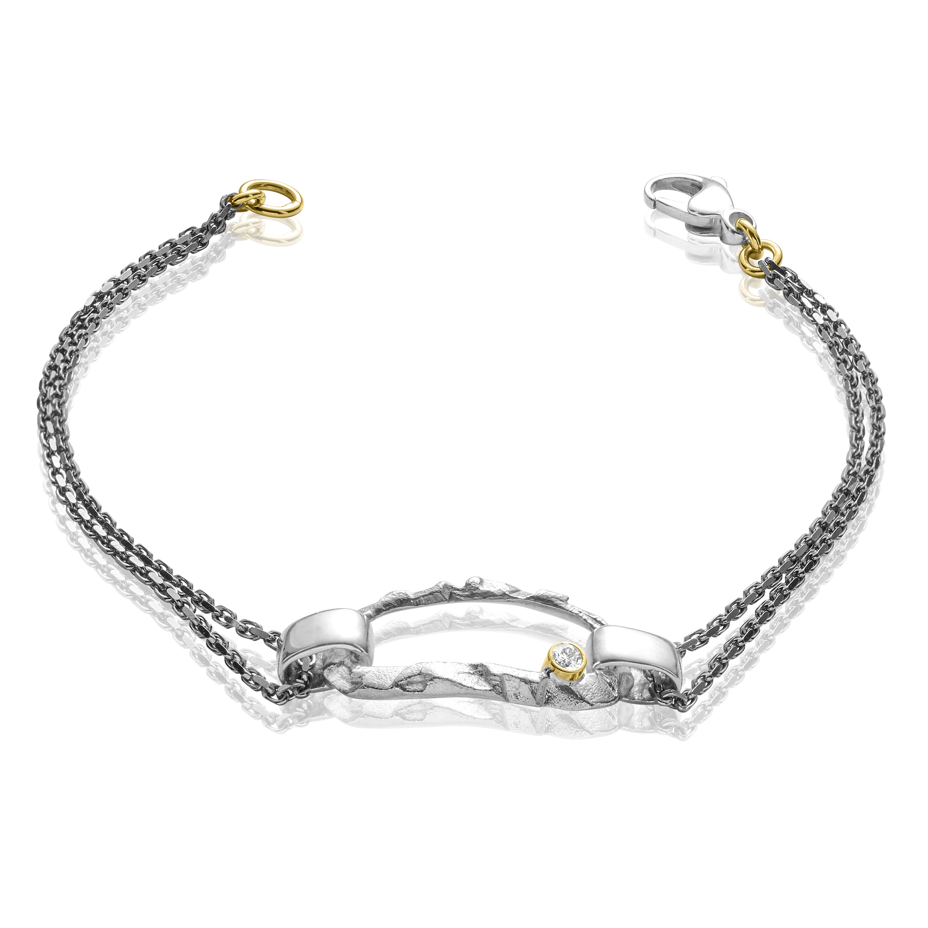 Iwa Exquis Exquisite black silver/silver bracelet with gold and diamond.