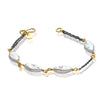 Hanako Albe Exquisite black silver and gold bracelet with pearls.