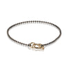 Kairy Exquis Timeless black silver bracelet with gold clasp.